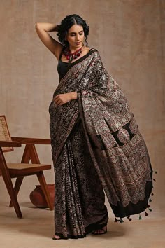 Jahangir Khatri Ajrakh Handblock Print Black Saree With Tassels Online. Traditional Hand Block Printed Ajrakh Saree. Ajrak Print Saree, Black Ajrakh Saree, Ajrakh Print Kurti, Saree Aesthetic, Simple Bridal Hairstyle, Cotton Printed Saree, Ajrakh Sarees, Saree Casual, Onam Saree