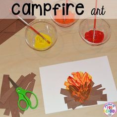 the campfire art project is made with construction paper and colored watercolors for kids to make