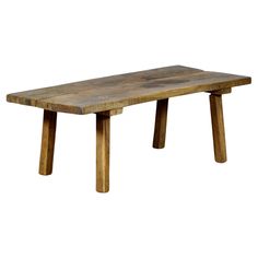 a wooden table sitting on top of a white background