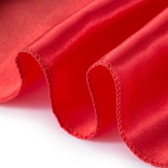 red satin fabric on white background