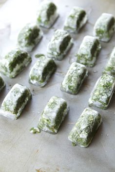 there are many green candies on the baking sheet