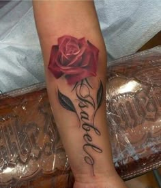 a rose with the word love written in cursive writing and a single flower