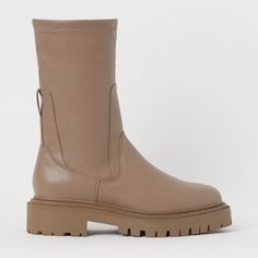 These Winter-Ready Mushroom Colored Boots From H&M Are A Stylish Way To Keep Warm! The Boots Hit Mid-Calf And The Shaft Is About 10 Inches High. They Have Round Toes And Are Made From A Smooth Faux Leather In A Taupe Beige Color. The Boots Feature A 1.5-Inch Thick Lug Sole For Good Traction. Wear These With A Cream Colored Sweater Dress Or With Winter White Jeans And A Fluffy Cardigan These Boots Are New With Tags (Nwt) And Have Never Been Worn These Are A European Size 38 And Should Fit A Size H&m Trendy Round Toe Boots, Trendy H&m Boots With Round Toe, Trendy H&m Round Toe Boots, H&m Leather Winter Boots, H&m Casual Winter Boots, Casual Winter Boots By H&m, H&m Casual Boots For Fall, Trendy H&m Winter Boots, H&m Casual Fall Boots