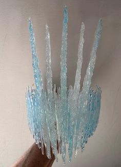 The Glacial Blue Ice Queen Crown headdress has 5 intricately formed, spectacular, transparent, glistening icicles surrounded by multiple layers of smaller glistening ice shards, all in beautiful variegated transparent glacial blue, just like glacial ice.  Now available with added iridescence to each icicle and ice shard! See the video and select 'with' or 'without' iridescence at the checkout.  To help ensure the headdress stays in place on every individual head shape, there is an option to have Ice Queen Costume Diy, Winter Princess Aesthetic, Ice Princess Costume, Ice Queen Crown, Ice Shards, Ice Costume, Ice Crown, Ice Queen Costume, Crown Costume