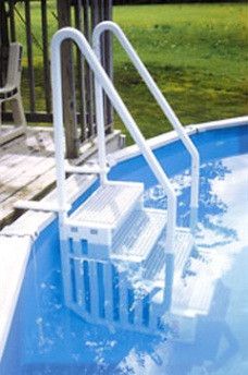 an above ground swimming pool with steps leading up to it