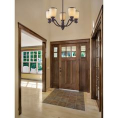 an entry way with two doors and three lights