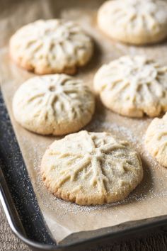 freshly baked cookies on a baking sheet ready to be eaten