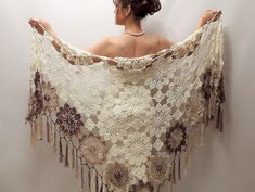 Cotton Evening Shawl MATERİAL: 100% pure cotton. COLOR: Ivory cream with multicolor ( cream, beige, brown ) border motifs and fringes. MEASUREMENTS: Length: 87'' ( 220cm) Width: 39'' (100cm) (without fringes) CARE INSTRUCTIONS: Hand washed or put in a delicate washing cycle of 40oC/104oF, or lower. More shawls and wraps in my shop: https://www.etsy.com/shop/Minnoshko?ref=l2-shopheader-name§ion_id=20621720 More handmade accessories and clothing in my shop: https://www.etsy.com/shop/Minnoshko?ref= Beige Bohemian Shawl With Intricate Embroidery, Bohemian Cream Crochet Lace Shawl, Brown Crochet Bohemian Shawl, Cream Crochet Lace Shawl, Bohemian Beige Crochet Lace Shawl, Evening Scarf, Boho Shawl, Evening Shawls, Bridal Shrug