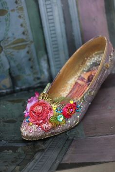 Ornate home decor piece, fairytale baroque shoe. Inspiration came one of my digital collages where i combined florals over museum canvas shoe photo and got the vision to embellish physical shoe with same rich color and details, musing the baroque era fashion. The 80' shoe has been covered with vintage and antique ornate lace pieces (mainly tambour lace) then painted with chalk paints to  mauve shades and gold, varnished, and embellished with silk blossoms, crystals and beads, seed beaded small blossoms. The inner sole is covered with printed vintage painting detail and painted with chalk paints, varnished matte. The outer sole is painted gold. Comes carefully packaged in cardboard box and bubble wrap. NB! This decorative piece is not a toy and not intended for children to play. Contains sm Decorated Pointe Shoes, Shoe Photo, Baroque Era, Fairy Shoes, Jeweled Shoes, Silk Florals, Digital Collages, Canvas Shoe, Era Fashion