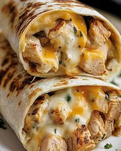 chicken and cheese burritos on a plate