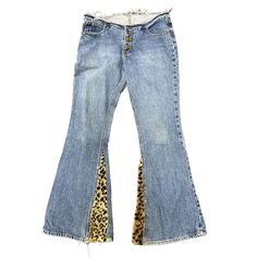 Vtg 90s Mudd Flare Bellbottoms Custom Leopard Fur Print Jeans Low Rise Size 9/11 Condition: These are a custom piece. The waist band was cut off to make them low rise and panels were added with a fuzzy leopard print fabric. There is a faint discolored spot on the seat and the belt loops were removed leaving small holes near the waist that should be an easy patch up. Overall very cool piece. The size tag was removed but measures comparable to a vintage 9/11 size, but please see measurements to ensure a proper fit. Measured flat unstretched. Double the measurements for complete circumference. Waist 16.5" Hips 18.5" Rise 9" Inseam 33 " Please see photos. Ask any questions before purchasing. Leopard Print Fabric, Low Waist Jeans, Jeans Low Rise, Print Jeans, Jeans Low, Y2k Jeans, Printed Jeans, Womens Jeans, Cute Fits