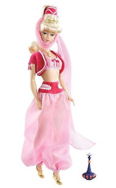 a barbie doll is standing next to a small toy rocket on a white surface and wearing a pink dress