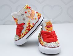 How adorable are these Winnie the pooh inspired converse! The perfect shoe to complete the look! Please leave your name needed in the notebox during checkout Visit the tutu section or search bar for the matching outfit! If you are unsure of sizing please scroll to the last photos for our size charts, or visit our size charts here--> https://pinktoesnhairbows.com/pages/size-chart All sales are FINAL, Ship dates can be found directly on the listing, please view our policies in detail here---> http Overalls Boys, Tutu Dress Costumes, Bling Converse, Baby Converse, Girls Overalls, Girls Converse, Pooh Baby, Matching Outfit, Birthday Tutu