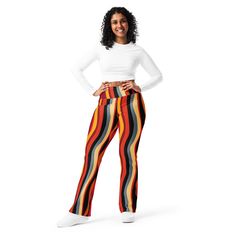 Designed to enhance your figure, these trendy leggings feature a high waist and a butt-lifting cut. The flared leg bottoms add a touch of style and make the leggings comfortable. Wear them on a walk, to the gym, or style them up with a bomber jacket or hoodie. * 74% recycled polyester, 26% elastane * Fabric weight (may vary by 5 7.37 oz./yd.² (250 g/m²) * Soft and stretchy premium quality fabric with a mild compression feel * Moisture-wicking fabric * UPF 50+ protection * High-waisted with a butt-lifting cut * Flared design from the knee down * Double-layered waistband with a pocket on the inside * The fabric is OEKO-TEX 100 standard certified * Blank product components sourced from China and Turkey Disclaimer: If body measurements fall between sizes, size up for a comfortable fit and size Trendy High Waist Multicolor Leggings, Retro Stretch High-waisted Pants, High Waist Multicolor Fitted Leggings, Trendy High Waist Fitted Yoga Pants, Trendy Fitted High-waist Yoga Pants, Trendy Yoga Pants With Elastic Waistband, Retro Stretch Bottoms With Elastic Waistband, Retro Fitted Bottoms With Elastic Waistband, Trendy Fitted Yoga Pants