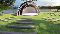 an artist's rendering of a circular concrete structure with steps leading up to it