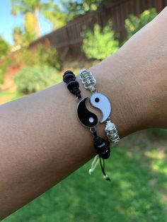 Ying and Yang Friendship Bracelets ☯️ The yin yang is an ancient symbol of harmony and balance. Both bracelets are included in your purchase. They can be worn together or given to a friend or lover. ✨ Symbolic Adjustable Friendship Bracelets, Symbolic Friendship Bracelets, Adjustable Symbolic Friendship Bracelets, Spiritual Black Braided Bracelets For Friendship, Black Round Casual Friendship Bracelets, Casual Black Round Friendship Bracelets, White Symbolic Friendship Bracelets, Symbolic White Bracelets For Friendship, Ying Yang Bracelet