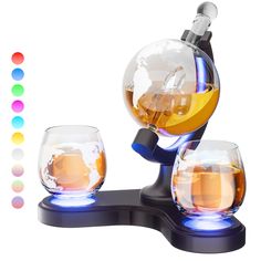 an image of two glasses on a stand with different colored circles in the back ground