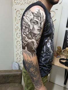 a man with a tattoo on his arm