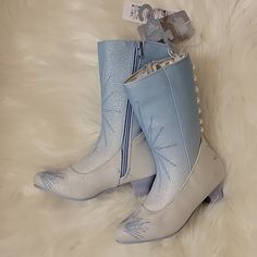 Disney Elsa Frozen Boots Blue And White New With Tags Genuine, Original, Authentic Disney Store Iridescent Glitter Coating; Decorative Pearl Buttons; Snowflake Screen Art Faux Leather Uppers; Full Zip For Easy On And Off Non-Slip Heel And Sole Please Note Shoes Run Small Elsa Shoes, Purple Rain Boots, Girls Cowgirl Boots, Disney Princess Toddler, Toddler Winter Boots, Frozen Blue, Screen Art, Glitter Boots, Disney Elsa