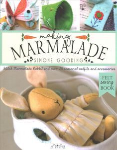 the cover of making marmalade, showing stuffed animals in a basket with ribbons