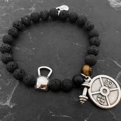 Lava Natural Stone Bracelet Kettlebell Tabata Workout & Weight. Elastic unisex bracelet (23inc 5,5cm) with 8mm natural stones : lava stone,tiger eye and agate stone 8mm. with a metal Kettlebell and your favorite Weight. Drop down: Weight Plate:Select Plate 45lbs or 25lbs Weight: your favorite weight IMPORTANT If in the picture there is a word missing from the drop down, either charm or ring, write in notes and if possible for your model, I put the one you choose. We send them throughout the Bracelet Bff, Bracelet Boyfriend, Tabata Workout, Fitness Armband, Gym Gifts, Tabata Workouts, Personalized Couple Gifts, Lava Bracelet, Fitness Bracelet