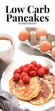 low carb pancakes with raspberries on a plate next to coffee and eggs