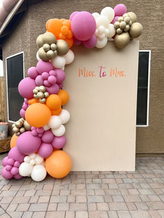 there is a sign that says miss to mrs with balloons all over the front of it