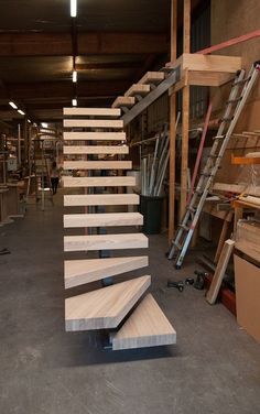 a set of stairs made out of wooden planks