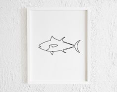 a black and white drawing of a shark