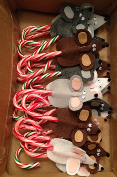 a box filled with candy canes and stuffed animals