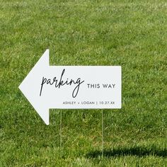 a white sign that says the wedding of an engaged couple on it in green grass