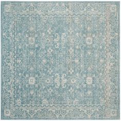 a blue and white rug with an intricate design