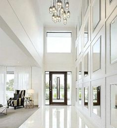 a large white room with lots of windows