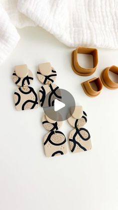 the video is showing how to use wooden shoes for making handmade earrings