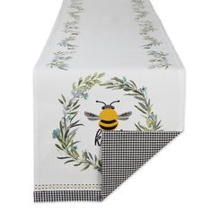 a table cloth with a bee on it