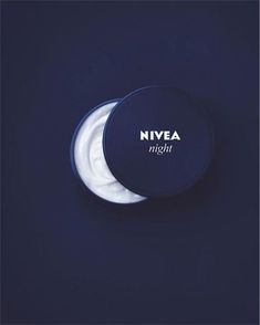 the nivea night cream is sitting next to a half moon