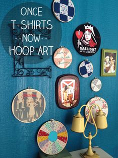 there is a blue wall with many different pictures on it and the words, once t - shirts now hoop art