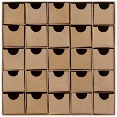 several cardboard boxes stacked on top of each other with holes in the middle and bottom