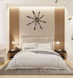 a large white bed sitting in a bedroom on top of a hard wood floor