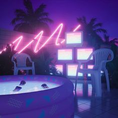 an inflatable hot tub surrounded by chairs and palm trees at night with neon lights