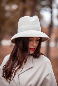 Ivory Millinery Couture Asymmetrical Crown Wide Brim Women - Etsy Ukraine White Fitted Fedora With Brim, Elegant White Fedora For Formal Occasions, Fitted White Fedora For Kentucky Derby, Elegant Cream Fedora Panama Hat, Cream Fedora Hat For Formal Occasions, White Fitted Fedora For Kentucky Derby, Elegant Cream Panama Hat With Flat Brim, Formal Cream Fedora Hat, Elegant White Fedora With Flat Brim