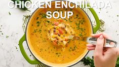 a person is spooning some soup out of a pot with the words chicken enchilada soup on it