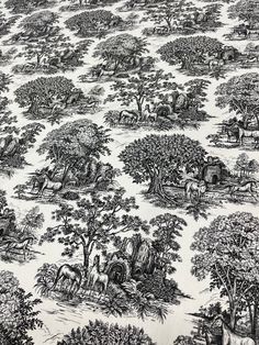 black and white toiler print fabric with horses, trees, and water in the background