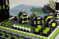 a lego model with green and black decorations