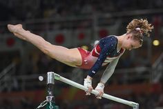 a female pole vaulter in action during a competition