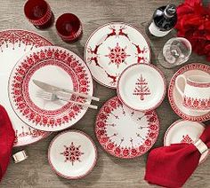 red and white dinnerware set on wooden table