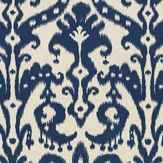 a blue and white pattern on fabric