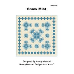 the snow mist quilt pattern is shown in blue and white