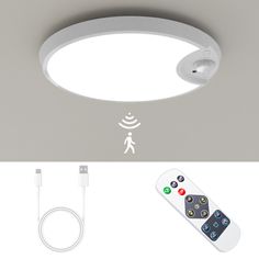 an image of a white ceiling light with remote control on the left and right side