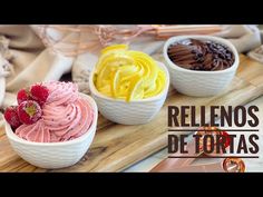 three bowls filled with different types of desserts on top of a wooden cutting board